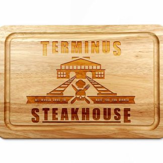 Terminus steakhouse chopping board on a white worktop