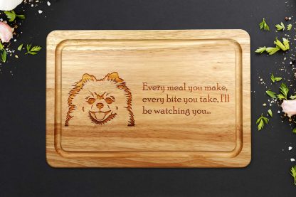 pomeranian chopping board on a dark work surface