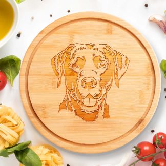 labrador portrait round chopping board on white worktop