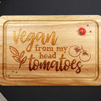 vegan from my head tomatoes--chopping board on grey worktop