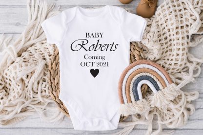 baby coming date white onesie