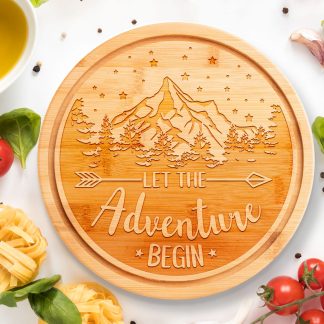 let the adventure begin round chopping board